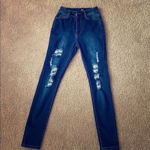 Dark denim distressed jeans